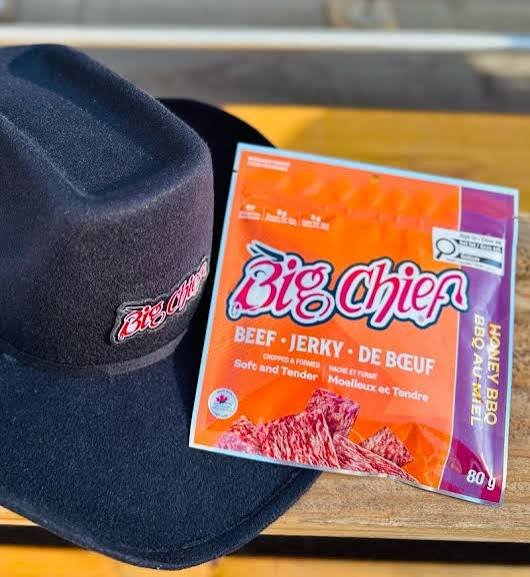 Big Chief Honey BBQ beef jerky package and branded black hat